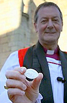 Bishop with badge